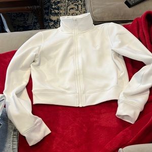 White TNA zip up medium